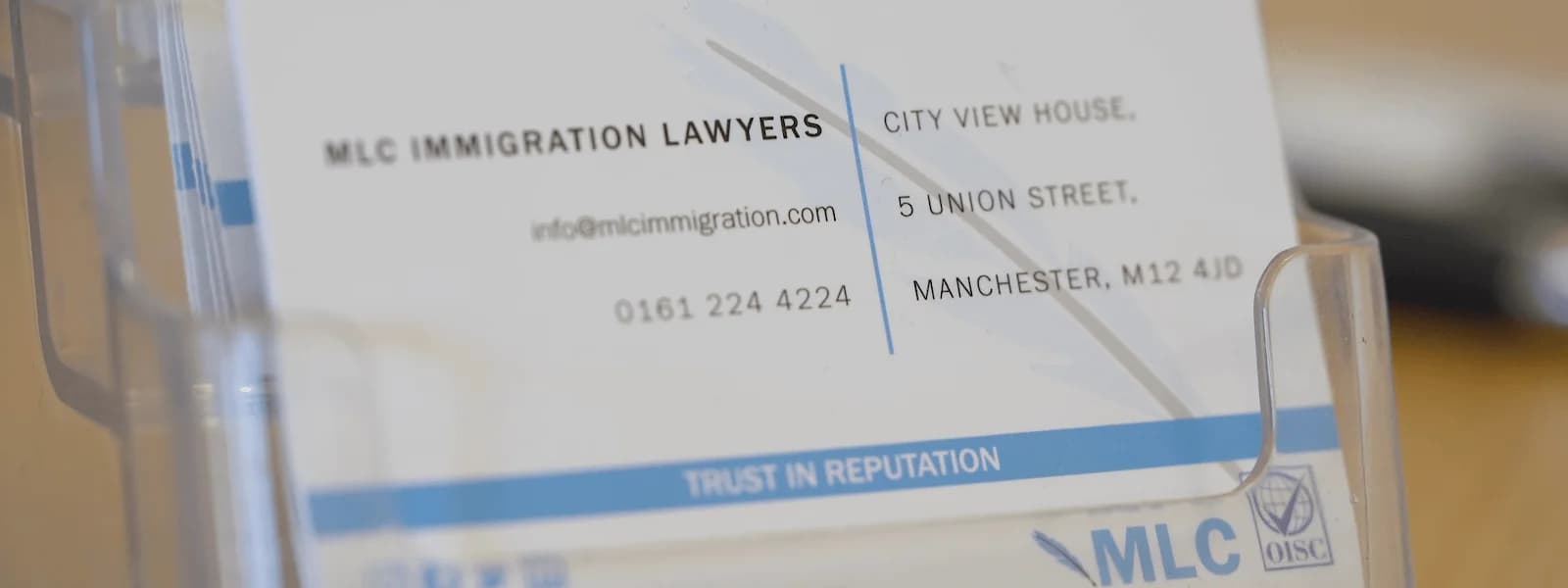 MLC Immigration Lawyers business cards ('Trust in Reputation', City View House address, 0161 224 4224)