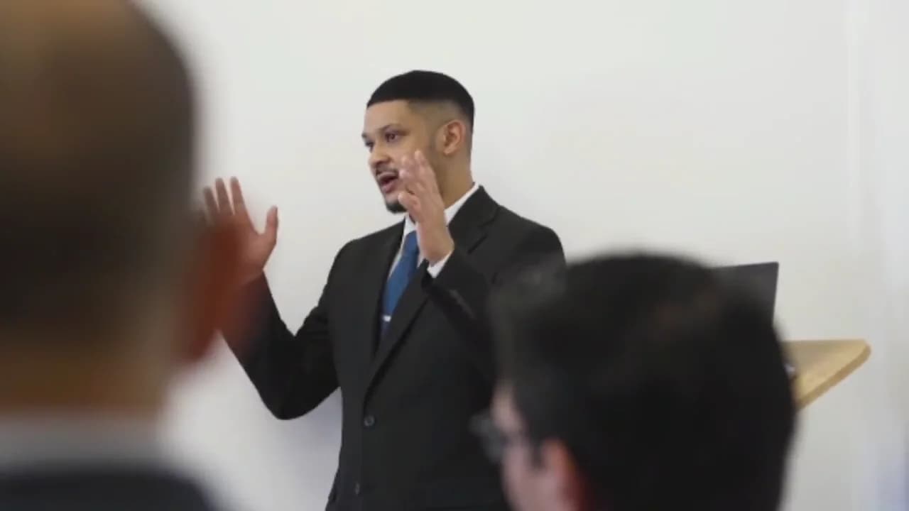 An adviser talking a case through with colleagues